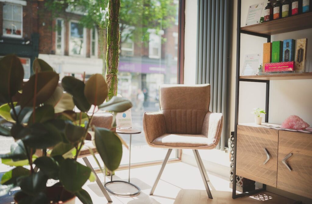 Asiatic massage place near  Islington Green, has a cupboard with massage oils and incense.