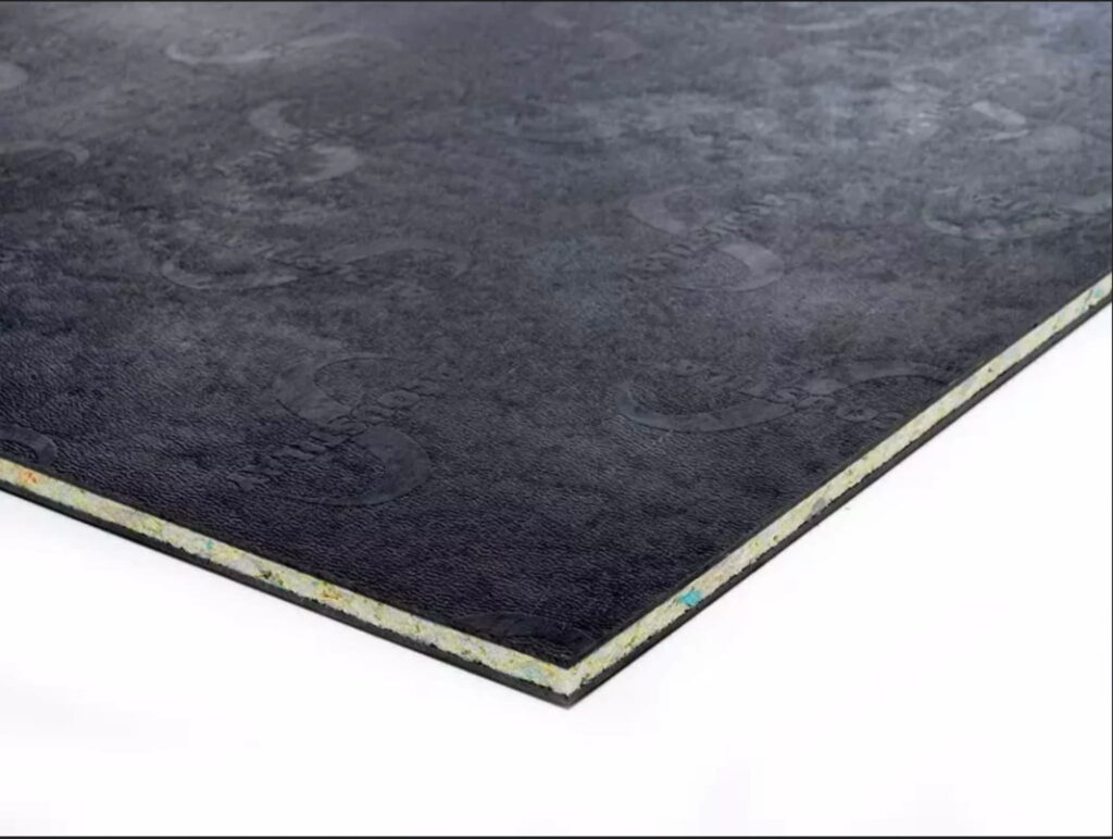 Technical installation of high-density acoustic under-layering used at Asiatic Thai Massage to ensure zero-footfall noise and clinical silence between therapy rooms.