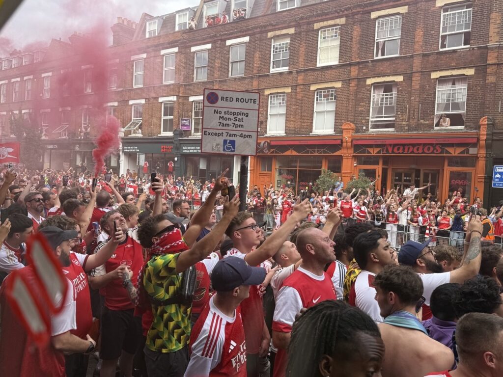 Arsenal fans near opposite Nandos on Upper Street during the 2025/26 victory parade.