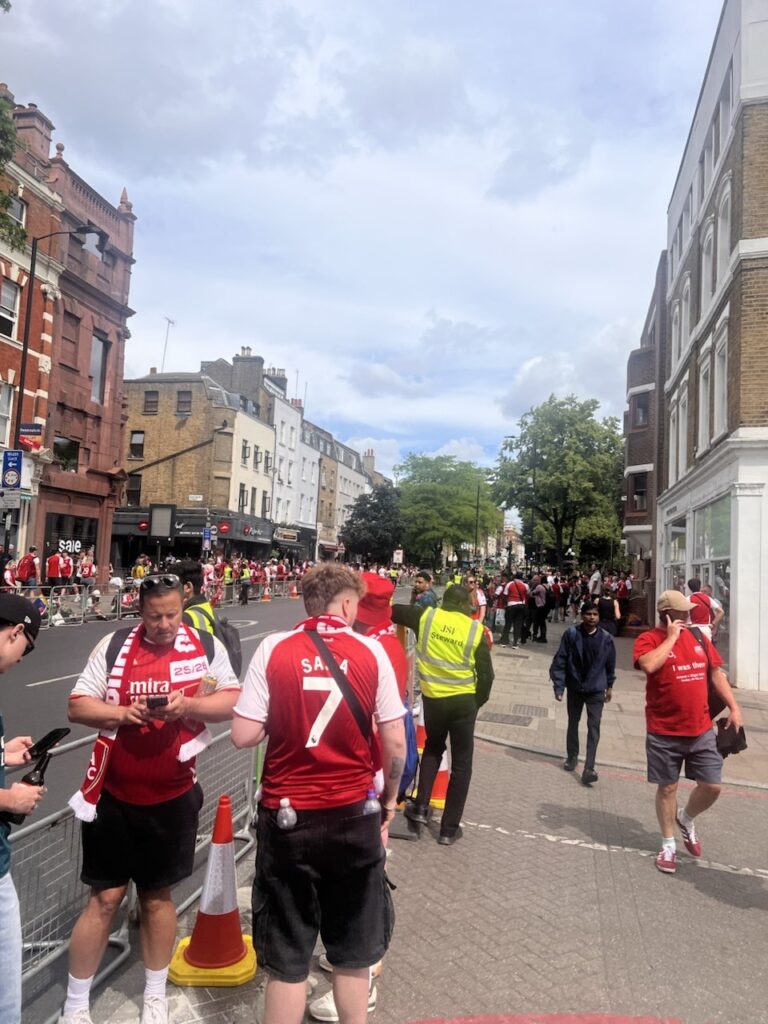 Arsenal fans near Islington Town Hall on Upper Street during the 2025/26 victory parade.