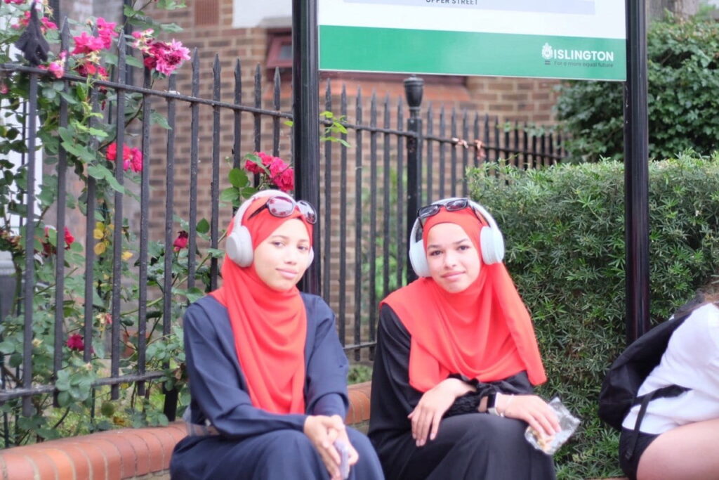 Two Arsenal fans near Town Hall in Upper Street.