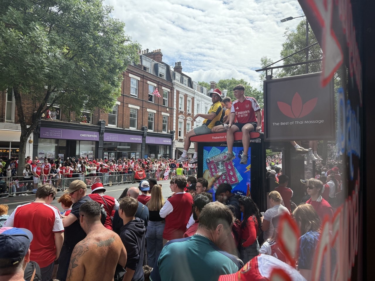 Arsenal fans outside Asiatic 93 Upper Street during the Islington parade.