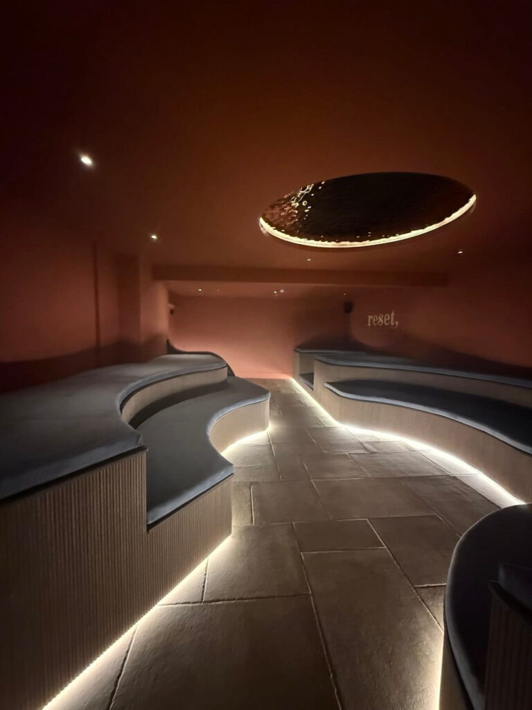 Breathwork area at Reset London on Upper Street, Islington, with warm terracotta design and soft lighting