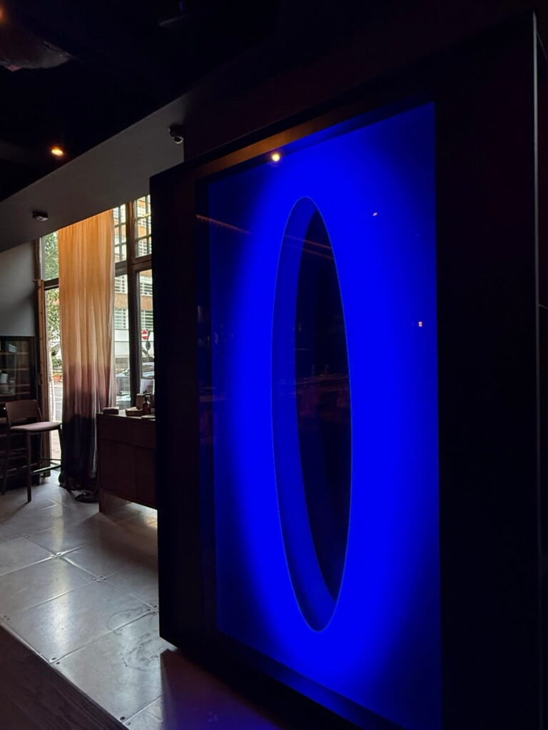 Minimal blue stargate-style interior feature inspired by Mareida London’s architectural restaurant design