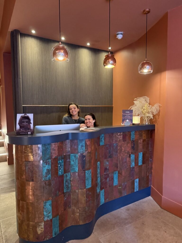 Receptionists at Reset Sauna, located on Upper Street near Highbury & Islington, London.