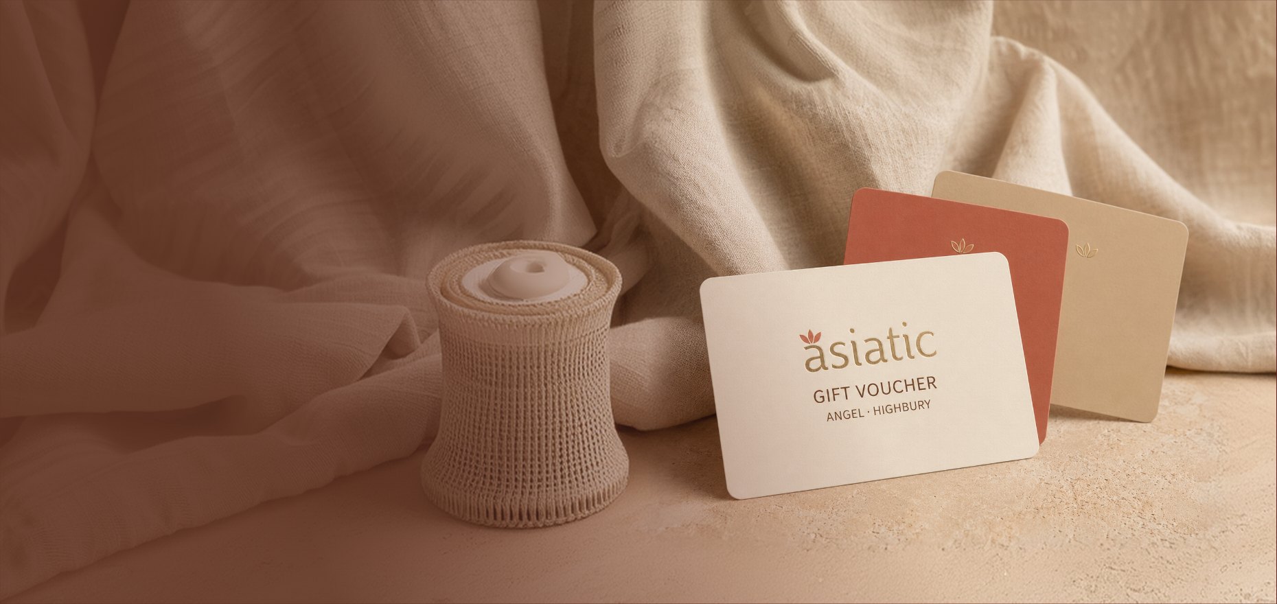 Asiatic gift voucher cards on linen